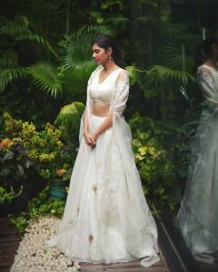 kalyani-priyadarshan-in-sleevless-white-lehanga-look-photos-011