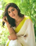 actress-kalyani-priyadarshan-new-photos-in-kerala-white-saree-with-golden-border-001