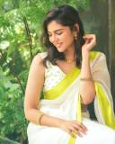 actress-kalyani-priyadarshan-new-photos-in-kerala-white-saree-with-golden-border-004