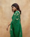celebrity-kalyani-priyadarshan-in-dark-green-saree-with-green-blouse-001