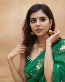 celebrity-kalyani-priyadarshan-in-dark-green-saree-with-green-blouse-002