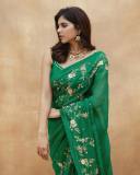 celebrity-kalyani-priyadarshan-in-dark-green-saree-with-green-blouse-003