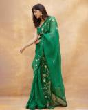 celebrity-kalyani-priyadarshan-in-dark-green-saree-with-green-blouse-004