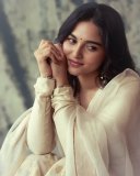 kayadu-lohar-in-Muted-ivory-off-white-and-pale-gold-tones-Elegant-ethnic-Sharara-and-softly-defined-eyes-with-thin-black-eyeliner-and-nude-pink-satin-lipstick-002