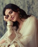 kayadu-lohar-in-Muted-ivory-off-white-and-pale-gold-tones-Elegant-ethnic-Sharara-and-softly-defined-eyes-with-thin-black-eyeliner-and-nude-pink-satin-lipstick