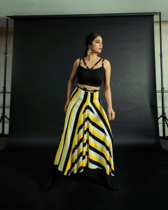 keerthy-suresh-new-photos-in-black-colour-top-with-yellow-line-skirt