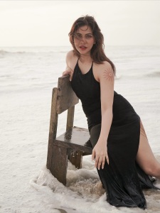 madonna-sebastian-in-black-dress-beach-photos