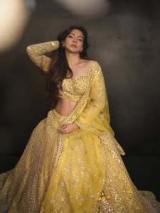 madonna-sebastian-in-lemon-yellow-lehenga-with-mirror-sequence-and-wide-neck-blouse-photos-004