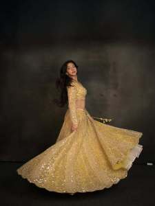madonna-sebastian-in-lemon-yellow-lehenga-with-mirror-sequence-and-wide-neck-blouse-photos-005