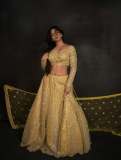 madonna-sebastian-in-lemon-yellow-lehenga-with-mirror-sequence-and-wide-neck-blouse-photos-001