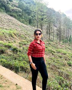 malavika-c-menon-in-red-dress-photos-008