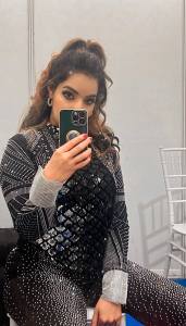 malavika-menon-in-black-Mock-Neck-Ripped-Crop-Tee-Leggings-photos-003