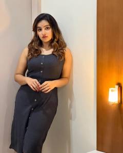 malavika-menon-in-black-sleeveless-a-line-dress
