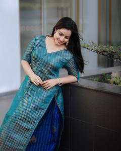 malavika-menon-in-ocean-blue-Banarasi-style-dress-photos-008