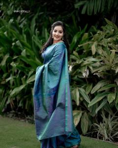 malavika-menon-in-peacock-color-saree-photos-004