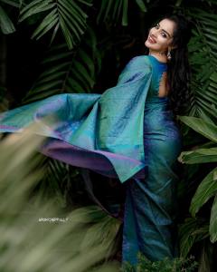 malavika-menon-in-peacock-color-saree-photos-008