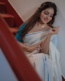 malavika-c-menon-in-set-saree-with-blue-blouse-combination-photos-005