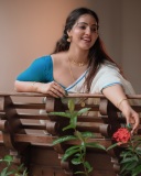 malavika-c-menon-in-set-saree-with-blue-blouse-combination-photos-006