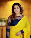 malavika-menon-in-yellow-saree-with-black-blouse-photos-004