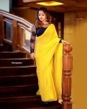 malavika-menon-in-yellow-saree-with-black-blouse-photos-005