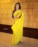 malavika-menon-in-yellow-saree-with-black-blouse-photos-007