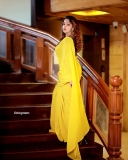 malavika-menon-in-yellow-saree-with-black-blouse-photos-008
