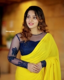 malavika-menon-in-yellow-saree-with-black-blouse-photos