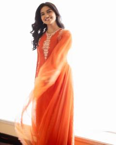 mamitha-baiju-in-orange-colour-full-length-party-wear-dress-photos-001
