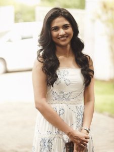 mamitha-baiju-in-white-sleeveless-top-photos-001