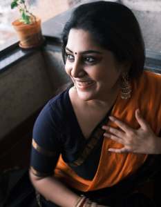 manjima-mohan-in-black-and-orange-saree-style-images-001