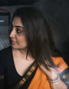 manjima-mohan-in-black-and-orange-saree-style-images-003