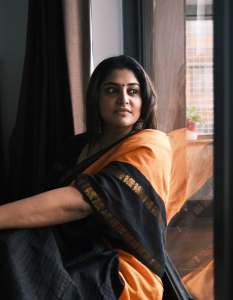 manjima-mohan-in-black-and-orange-saree-style-images-005
