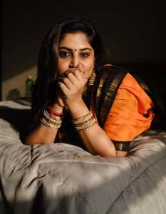 manjima-mohan-in-black-and-orange-saree-style-images-007