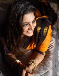 manjima-mohan-in-black-and-orange-saree-style-images-008