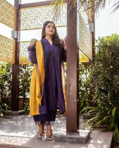 manjima-mohan-in-violet-and-mango-red-combination-dress-photos