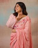 manjima-mohan-in-kavana-peach-pure-linen-saree-photos