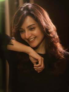 manju-warrier-in-black-and-olive-green-out-outfit-combination-photos-006