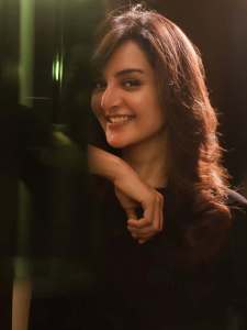 manju-warrier-in-black-and-olive-green-out-outfit-combination-photos-009