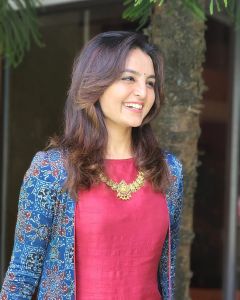 manju-warrier-in-red-colour-outfit-with-jacket-001