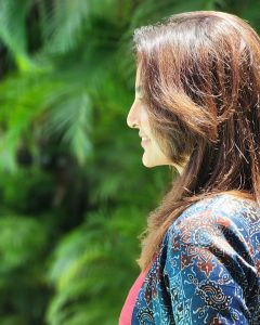 manju-warrier-in-red-colour-outfit-with-jacket-002