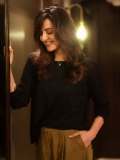 manju-warrier-in-black-and-olive-green-out-outfit-combination-photos-003