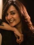 manju-warrier-in-black-and-olive-green-out-outfit-combination-photos-005