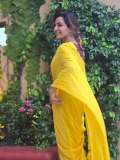 manju-warrier-in-yellow-saree-with-kalamkari-blouse-pics-005