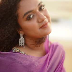 mareena-michael-kurisingal-in-purple-colour-out-fit-photos-005