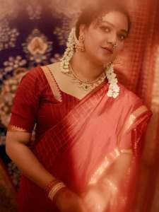 mareena-michael-kurisingal-in-red-saree-traditional-style-images-005