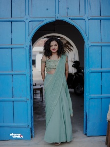 mareena-michael-kurisingal-in-sky-colour-party-wear-saree-with-styling-look-photos-006