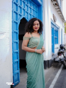 mareena-michael-kurisingal-in-sky-colour-party-wear-saree-with-styling-look-photos-008
