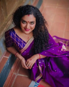 mareena-michael-kurisingal-in-violet-pattu-saree-photos-001