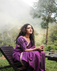 mareena-michael-kurisingal-in-violet-pattu-saree-photos-003