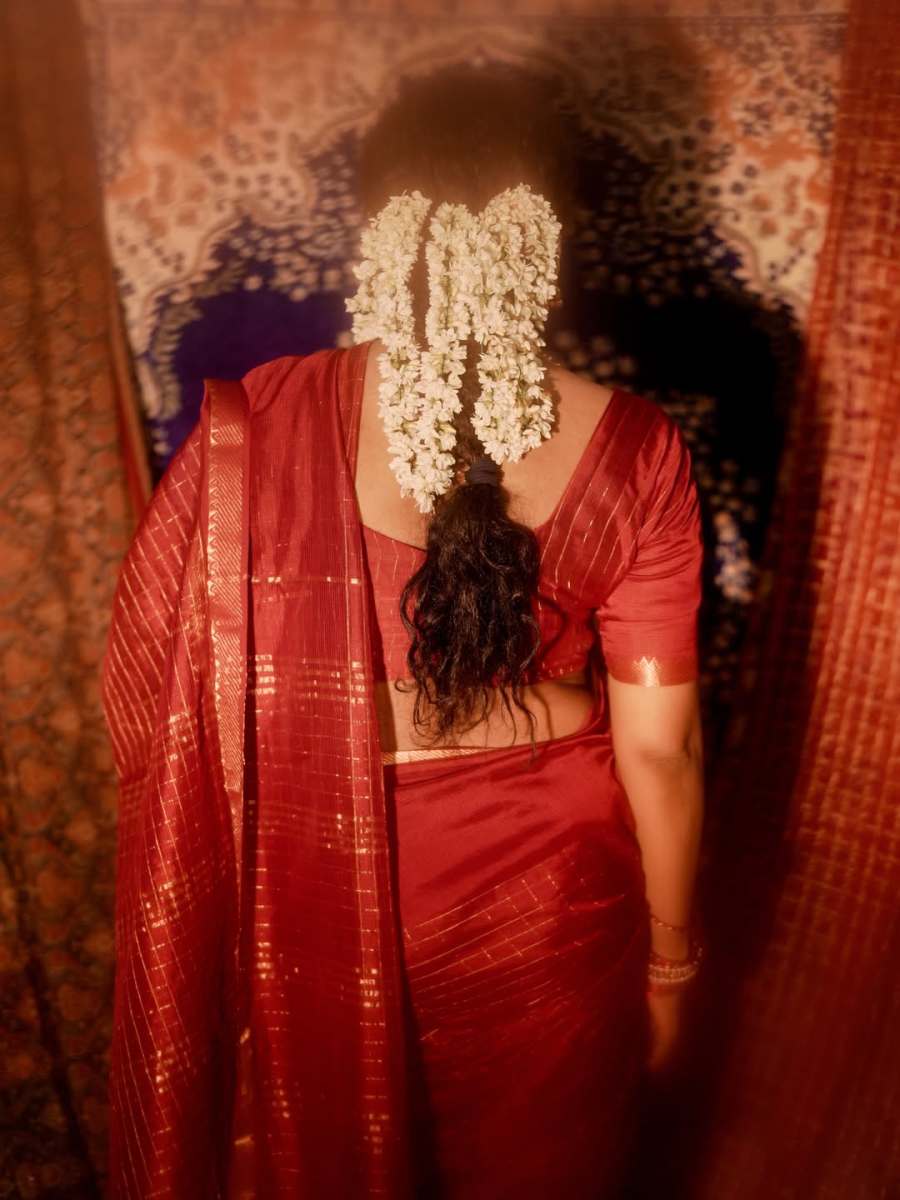 mareena-michael-kurisingal-in-red-saree-traditional-style-images-001